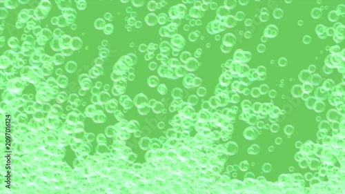 Realistic soap bubbles rising and moving up animation loop on a green screen chroma key background