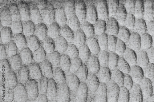 Schilderij op canvas Textured surface with repeating oval shapes and rough linear marks
