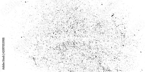Fotografía Dust and particles scattered across a white surface, creating an abstract texture of granular elements