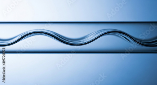 Close-up of a Wavy Glass Condenser Tube for Scientific Laboratory Research and Chemical Experiments in Blue Light