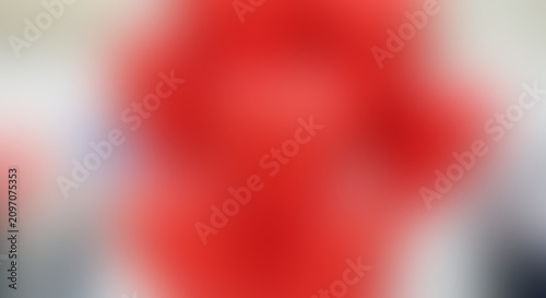 Konstfotografi Abstract red and white swirls with soft focus and gradient blending grey blur