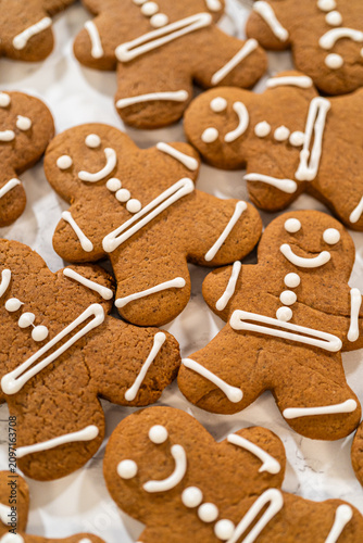 Decorating Gingerbread Man Cookies with Royal Icing for Festive Occasions