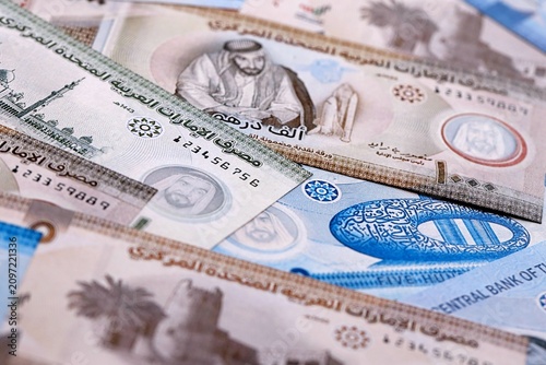 Obraz na plátně UAE dirham money bills pile on table