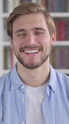Portrait of Man Shaking Head as Yes Sign, Approval, Vertical Video
