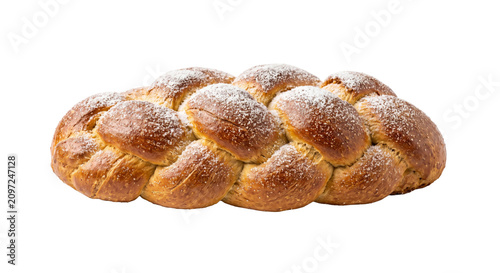 Fotografía Golden brown braided challah bread dusted with powdered sugar on a white backgro