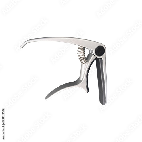 Capo for guitar isolated on white background.