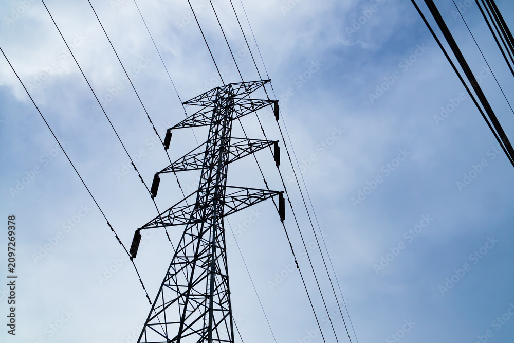 Fototapeta premium High voltage electric pole power line electric transmission tower background, technology energy clean ecosystem change green environment, substation construction pylon generator grid electricity.