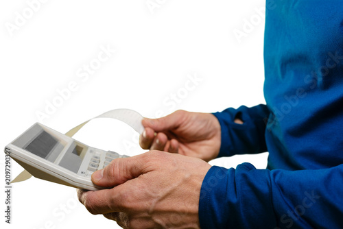 Fotografie Man holding receipts calculator reconciling expenses, closeup hands feeding rece