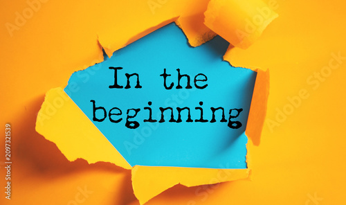 Foto IN The beginning. text on white paper