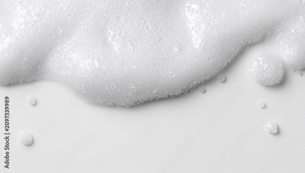 Fototapeta premium Bubbling Foam on a Smooth White Surface with Soft Shadows