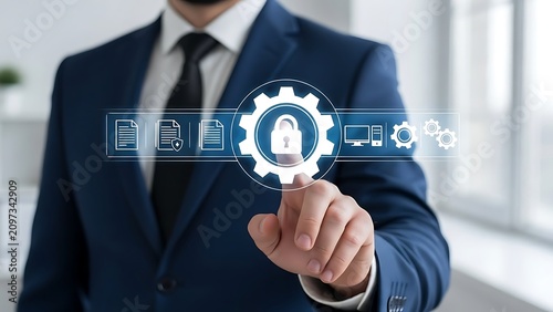 Businessman in a blue suit touching a digital interface showing a padlock inside a gear, document and computer symbols for data security