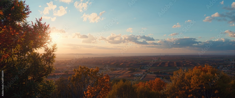 Fototapeta premium Autumn Landscape View with Sunset Lighting - Rolling Fields, Warm Colors, Panoramic Scene