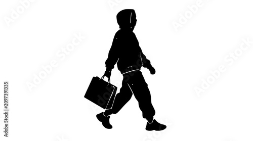 Bilde på lerret Model carrying shopping bag walking silhouette