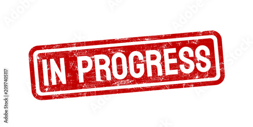 In progress red rubber stamp with grunge texture