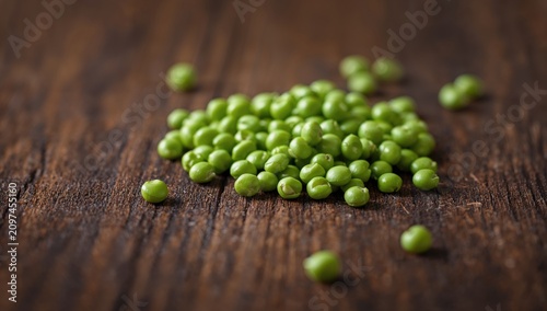 Green Peas Piled on Dark Wo...