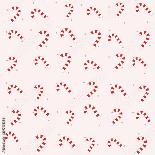 Christmas seamless pattern with tossed candy canes on blush