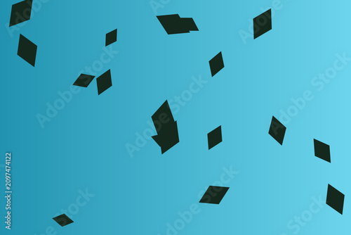Canvas Print A vibrant blue background with black confetti pieces floating in the air