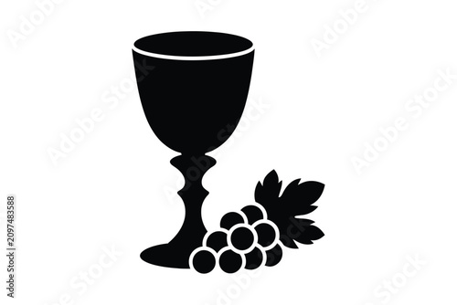 Black silhouette icon of a holy chalice cup and a bunch of fresh grapes with leaf representing christian holy communion and eucharist sacrament