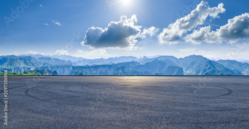 Empty asphalt road with skid marks overlooking the scenic mountains of Zhangjiajie, China