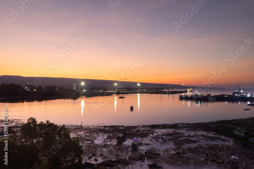I focus on setting up the tripod and camera, carefully composing the shot. I lock the ISO at 100, keep the aperture at f/22, and work the shutter speed from 8, to 15, all the way up to 30 seconds