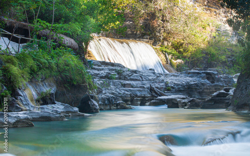 Amazingly, in East Sumba which has a long dry season and hard, rocky, coral-like soil—there are still waterfalls, cutting through the stone mountains and absolutely beautiful