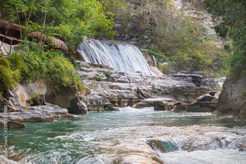 Amazingly, in East Sumba which has a long dry season and hard, rocky, coral-like soil—there are still waterfalls, cutting through the stone mountains and absolutely beautiful
