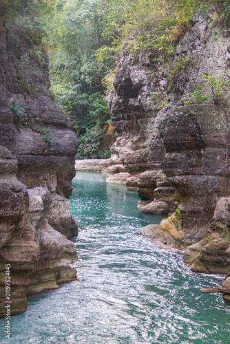 Amazingly, in East Sumba which has a long dry season and hard, rocky, coral-like soil—there are still waterfalls, cutting through the stone mountains and absolutely beautiful