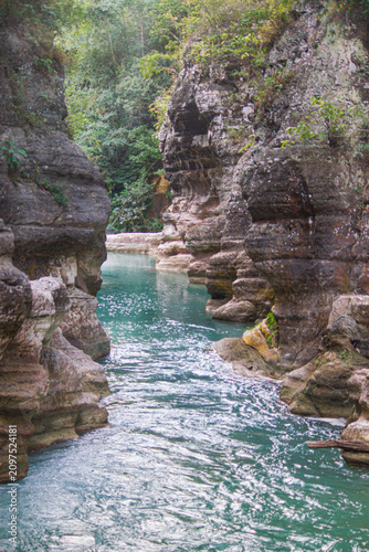 Amazingly, in East Sumba which has a long dry season and hard, rocky, coral-like soil—there are still waterfalls, cutting through the stone mountains and absolutely beautiful