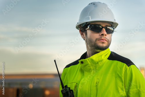 Fotografía Portrait of professional engineer in safety gear at oil refinery, Industrial wor