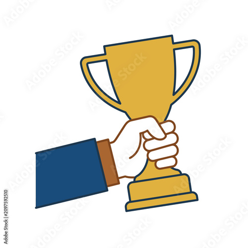 Fotografie A victorious hand firmly holds a gleaming golden trophy cup aloft