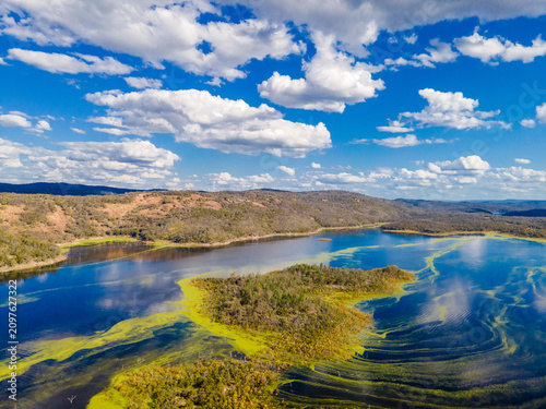 Aerial View at Copeton Dam Waters with the small lake and beautiful blue sky in Australia
