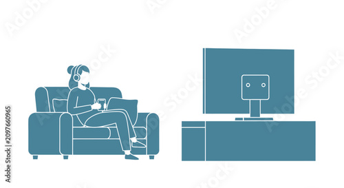 Fotografía Woman sitting on couch watching television.