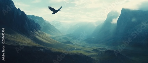 Majestic eagle soaring over mountain valley landscape
