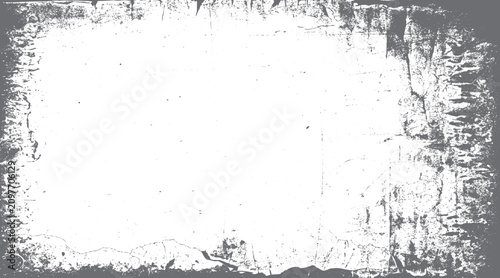 Distressed grey textured border with cracked paint and speckles on white background grunge