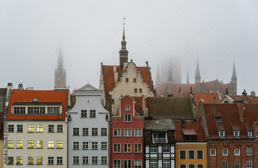 Obraz premium Panoramic view over the rooftops of the Old Town of Gdańsk, Poland.