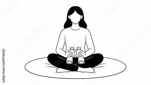 Bild auf Leinwand Woman sitting cross-legged holding a bottle.