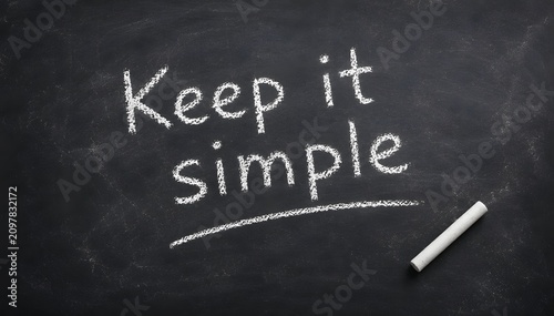 Embracing a Minimalist Approach for Enhanced Clarity and Understanding A Core Principle on a Dark Chalkboard Background