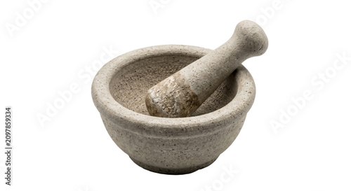 Fotografie Stone mortar and pestle for grinding herbs and spices in a kitchen