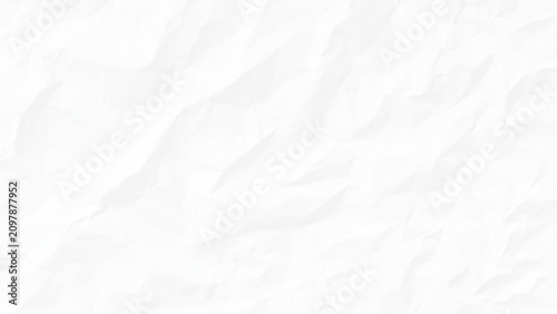 Crumpled white paper texture with soft folds and creases pattern
