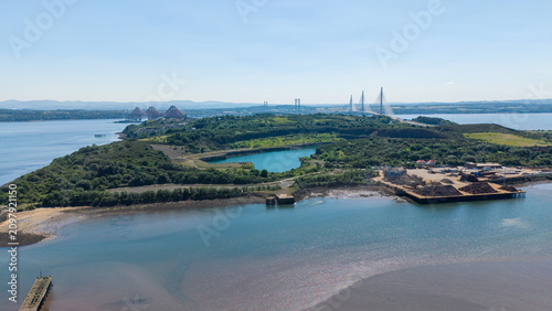 Quadro su tela Aerial drone view of Prestonhill Quarry filled with blue water in Inverkeithing,
