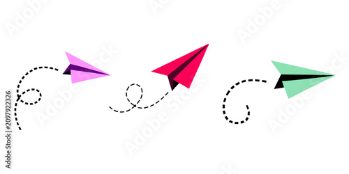 Fotografie Three colorful paper planes flying with dotted trail lines