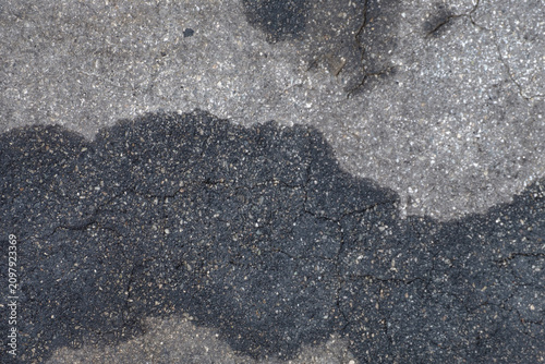 asphalt texture background with oil stains
