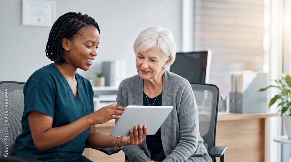 Fototapeta premium Smiling African nurse consulting senior Caucasian female patient in clinic office, using digital tablet to explain medical prescription, healthcare plan or elder care services illustration.
