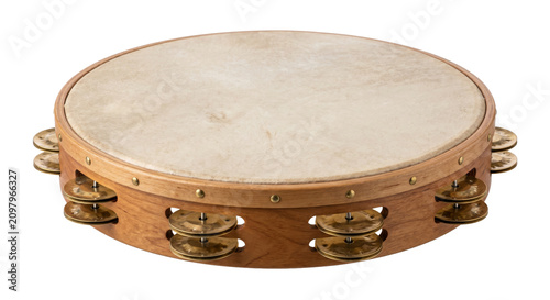 Foto Traditional wooden tambourine with natural skin drumhead and jingles