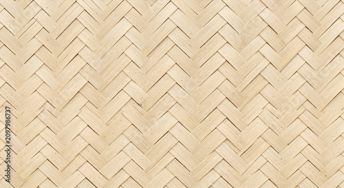 Light brown woven bamboo pattern background, traditional diagonal handicraft texture