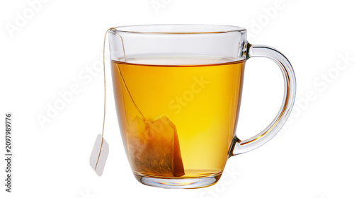 Canvas Print Clear glass mug filled with amber tea and a tea bag, isolated on transparent bac