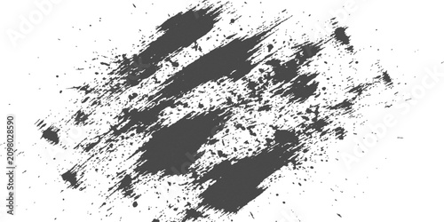 Foto Dark charcoal powder splash with fine particles and brush strokes on a white bac