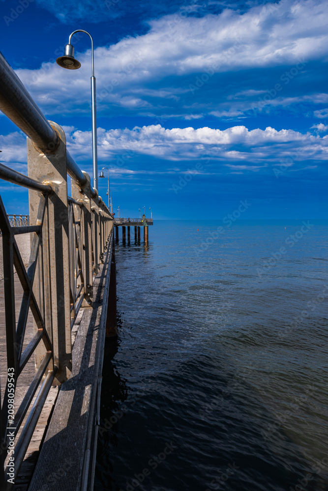 Fototapeta premium Pontile di Tonfano in Marina di Pietrasanta, Versilia, Tuscany, Italy.