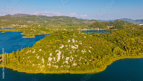 Tableau sur toile Aerial view of Bacina Lakes in Dalmatia, Croatia, featuring lush green hills, ro