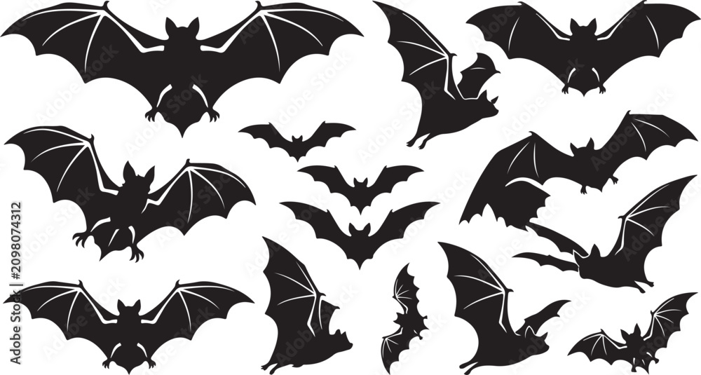 Fototapeta premium Set of black silhouettes of flying bats in different positions for halloween design